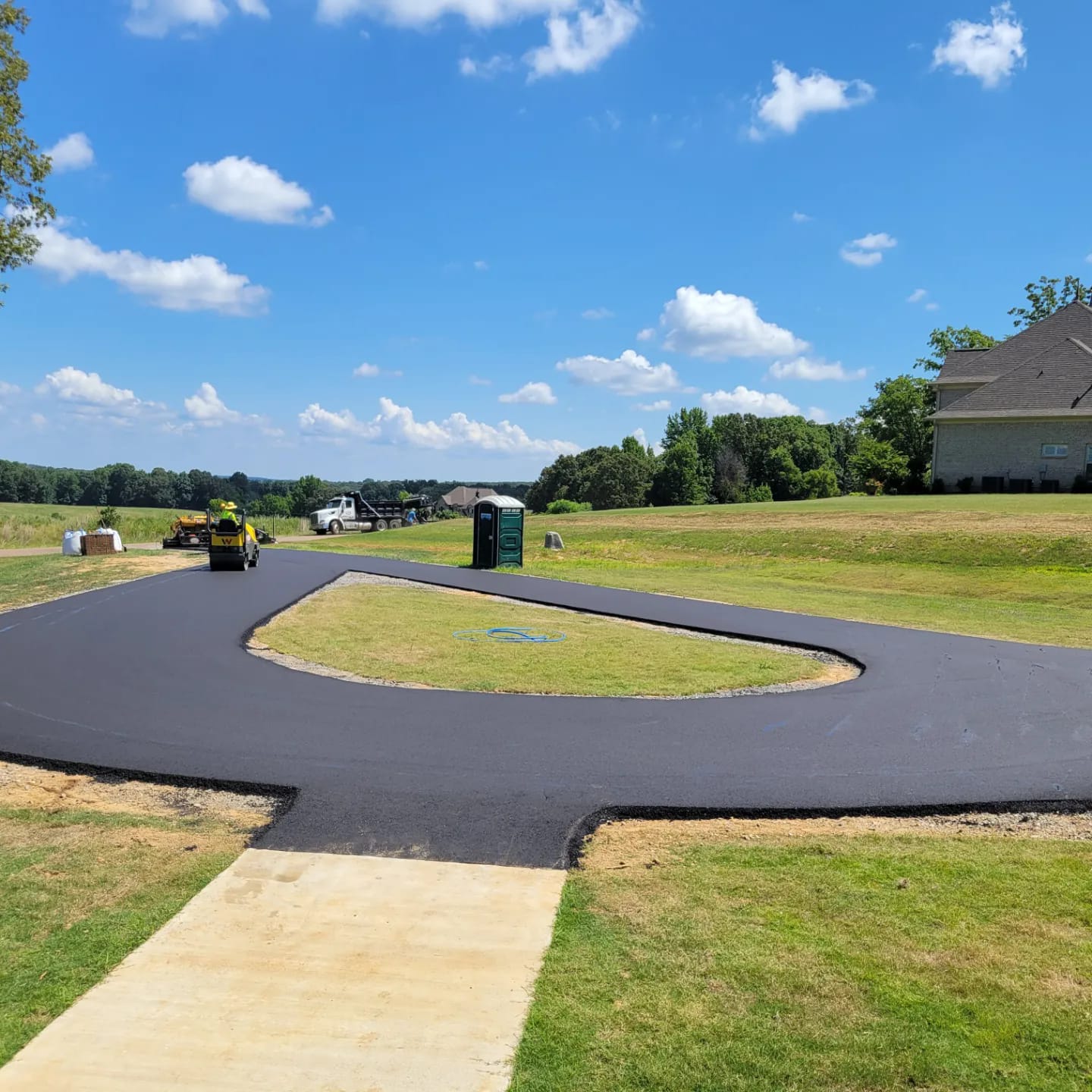 asphalt paving for turn around curve long driveway