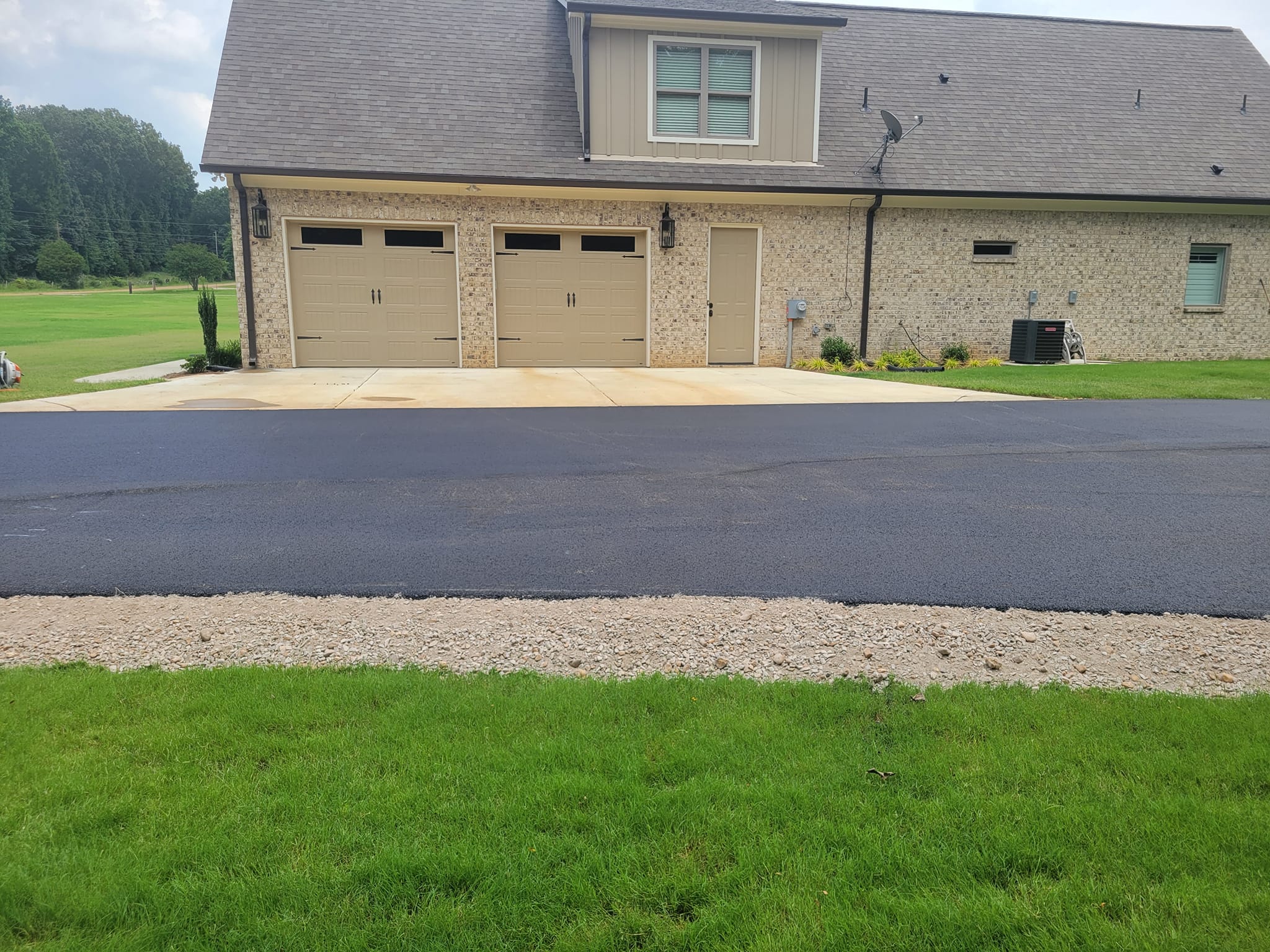 newly paved driveway for home