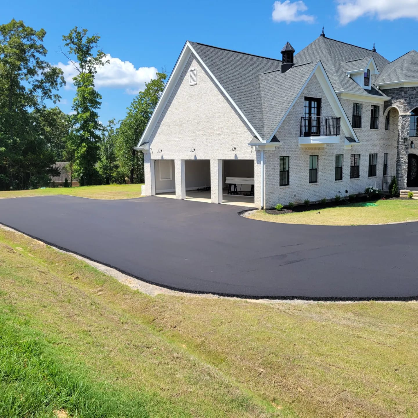 newly paved driveway for home